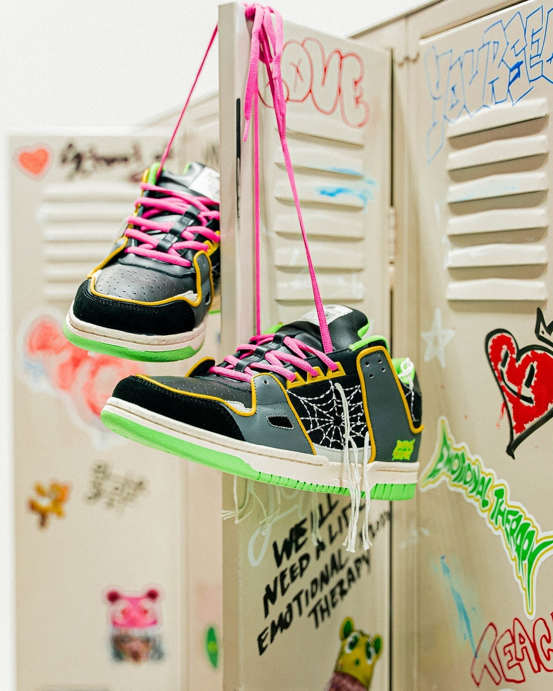 Emotional Therapy x Araña Studios Collab sneaker hanging from locker